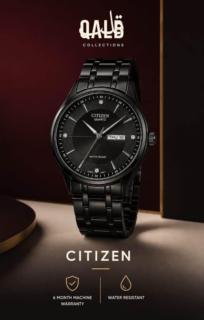 Citizen quartz day-date watch with a black finish case and bracelet on a cream stone pedestal